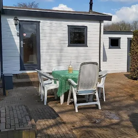 Horská chata Cosy Garden Familie Tot 4 Personen Op De Veluwe Bungalowpark De Kern Putten